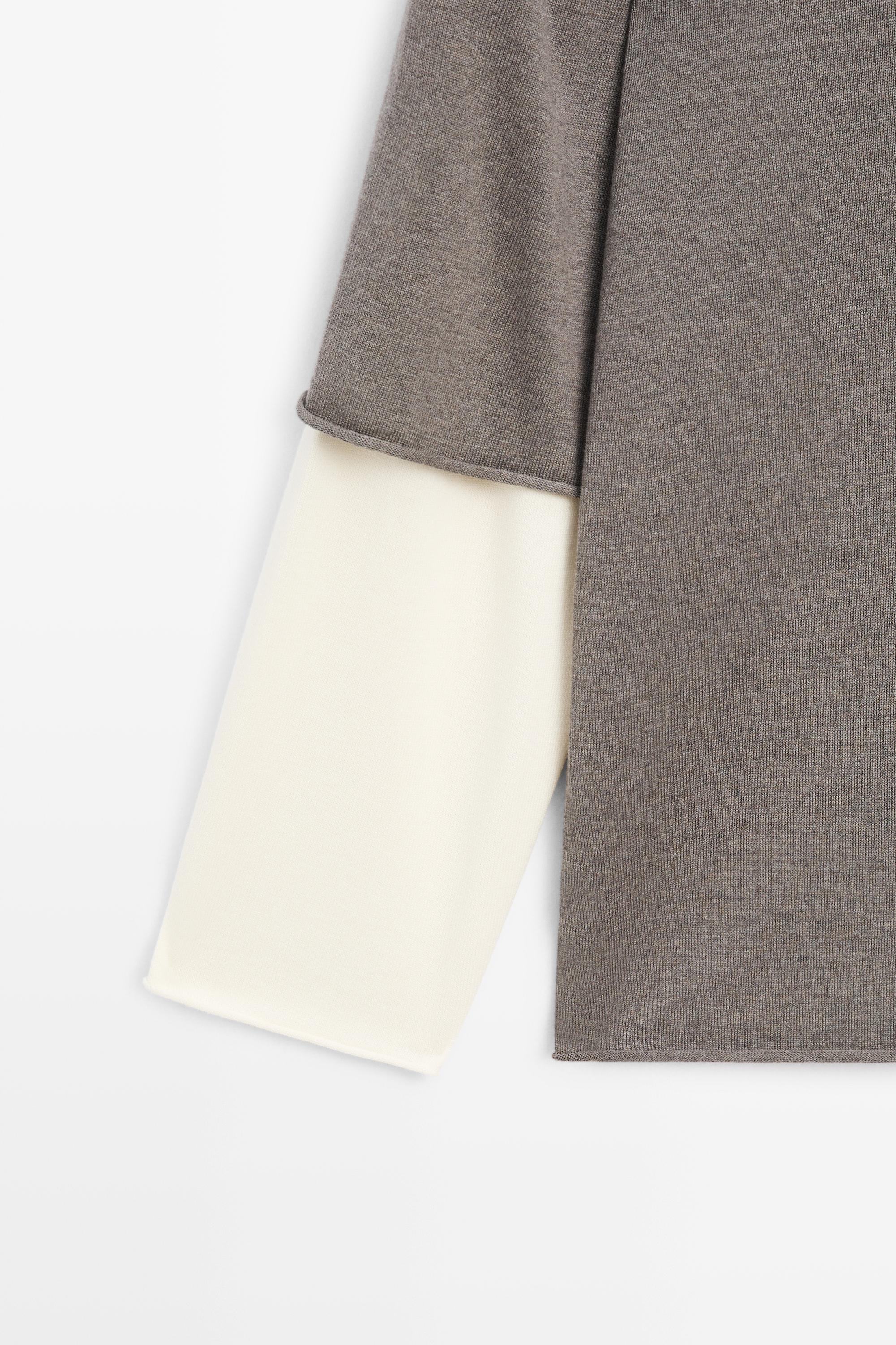 Oversize knit sweater with double sleeve detail